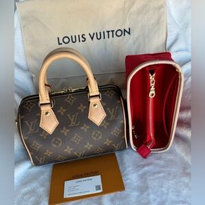 Louis Vuitton Speedy 20 in monogram.